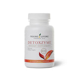 Detoxzyme de Young Living dans une bouteille pratique pour une routine digestive quotidienne.