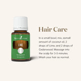 Gouttes déposées sur coton; huile citron vert Young Living pour aromathérapie légère.