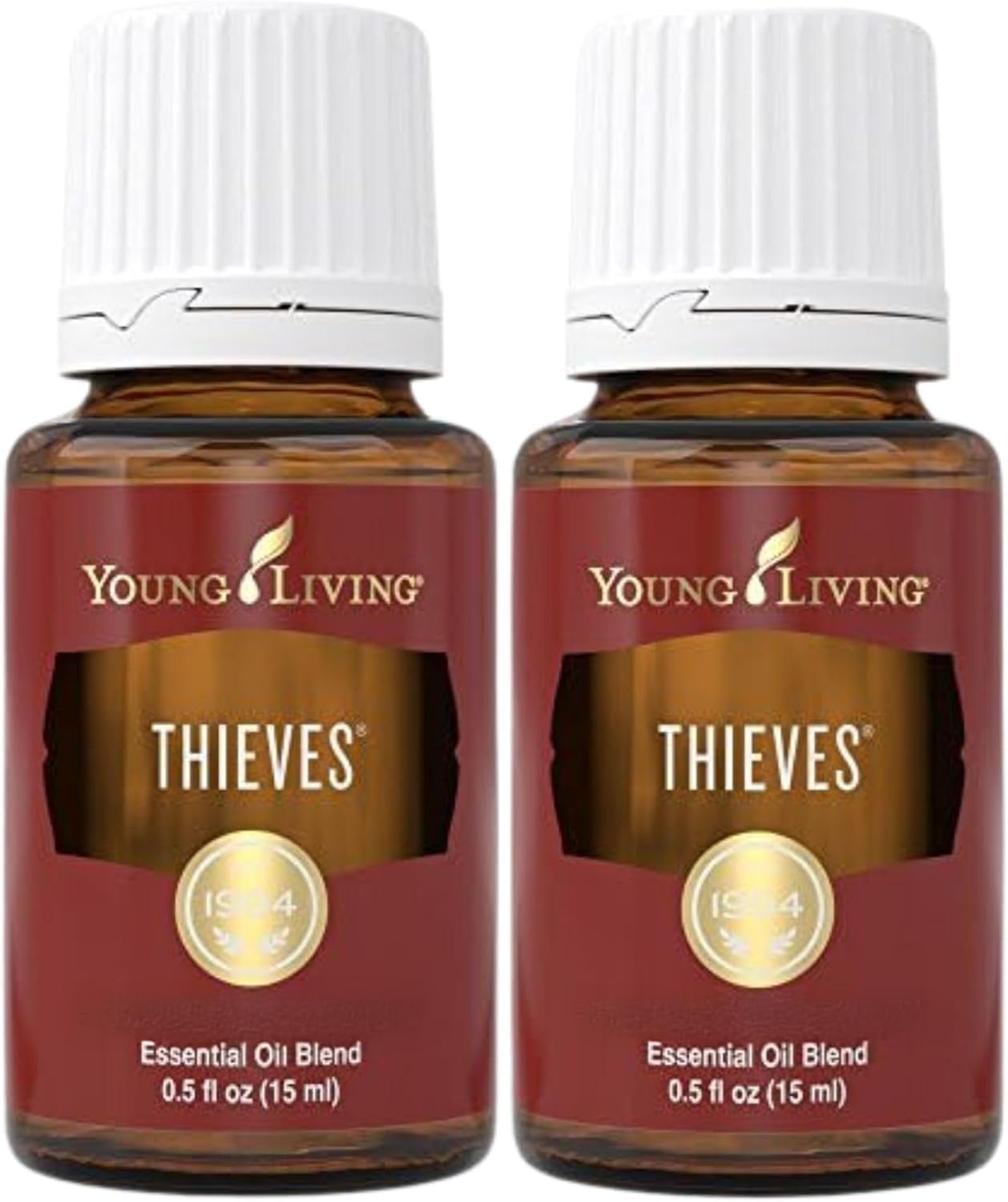 Young Living Thieves: bouteille huile essentielle, diffusion pour ambiance épicée et réconfortante.