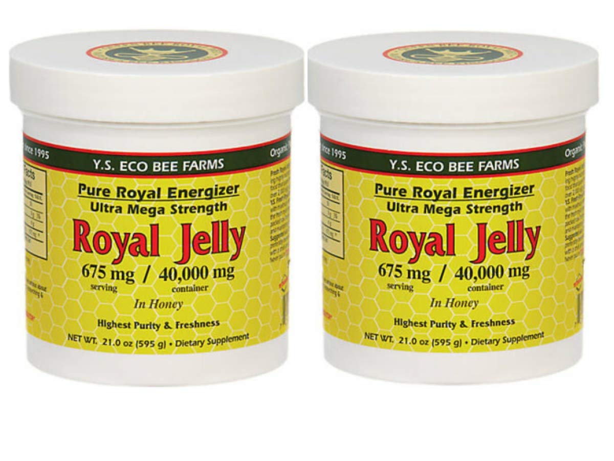Gelée royale YS Eco Bee Farms dans miel, flacon clair et riche en saveurs.