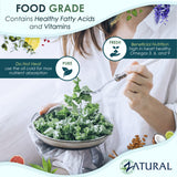 Flacon ouvert de Zatural huile de lin prête pour la vinaigrette maison.