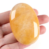 ZHIYUXI Jade jaune ovale: pierre de paume pour détente et équilibre.