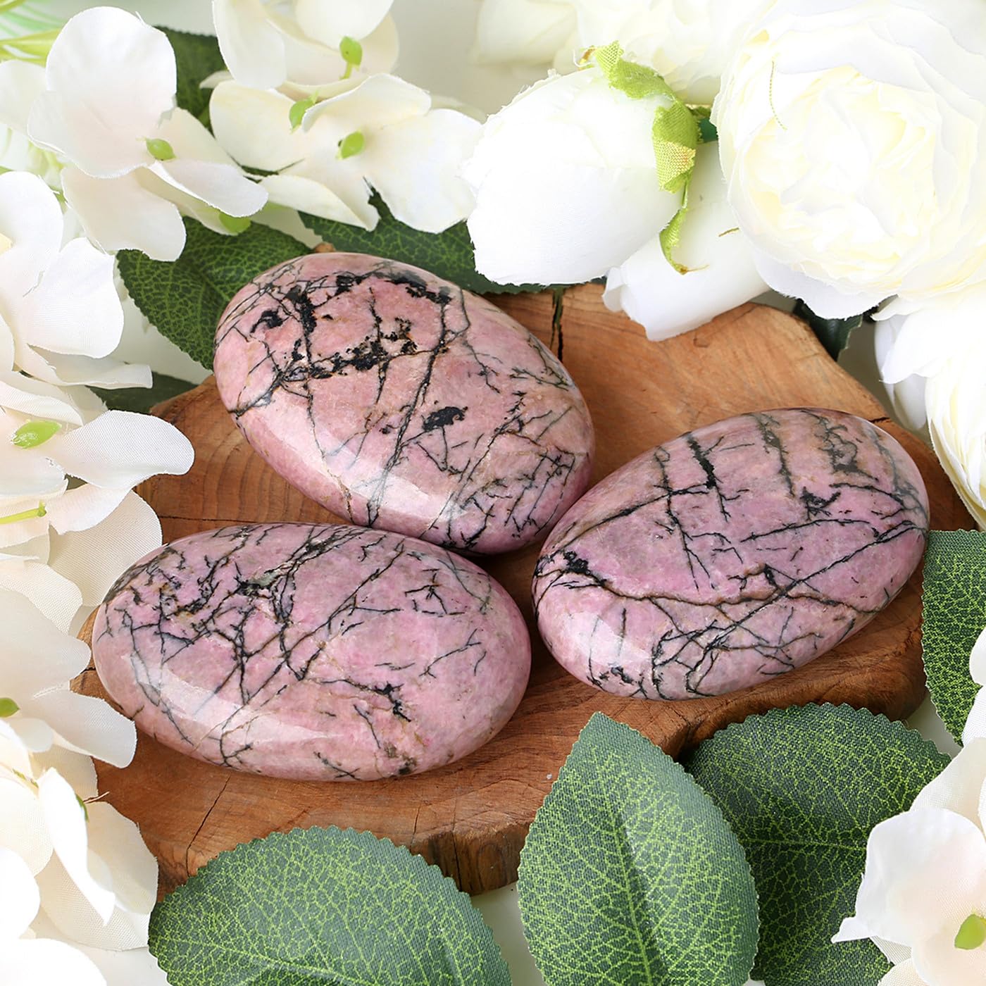 ZHIYUXI Rhodonite, vue paume ovale, favorise détente et concentration pendant les séances.