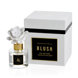 Diffuseur Zodax Apothecary Guild Blush en porcelaine avec fleur, ambiance raffinée.